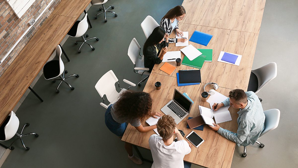 Group of students preparing for exam in university, top view